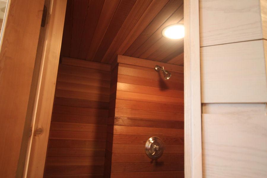 Sauna Room Designed with an Interior Shower