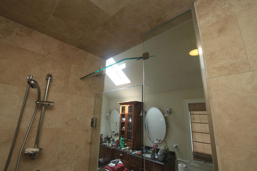 Frameless Steam Shower Door with a Hinged Top Panel