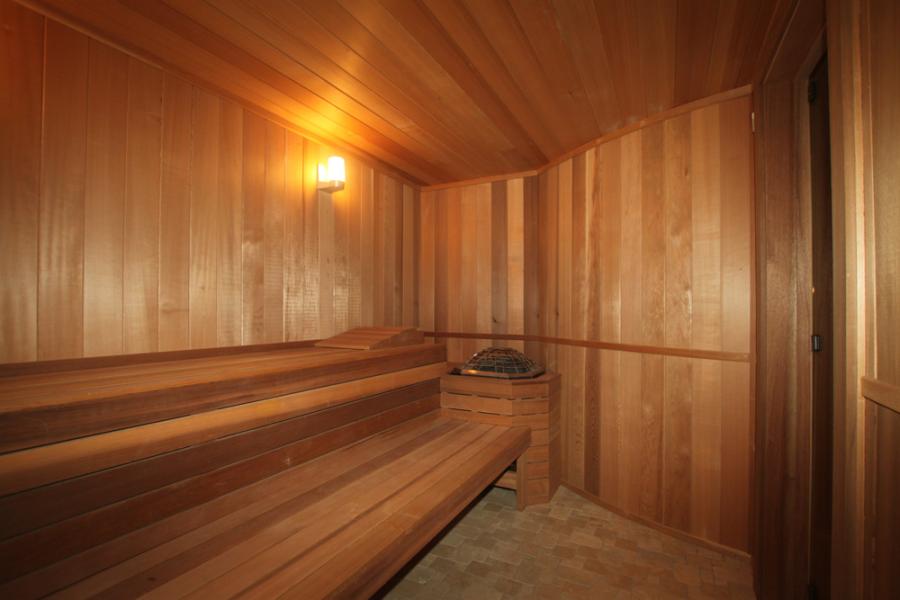 Tylo Home Sauna Room with a Custom Curved Wall